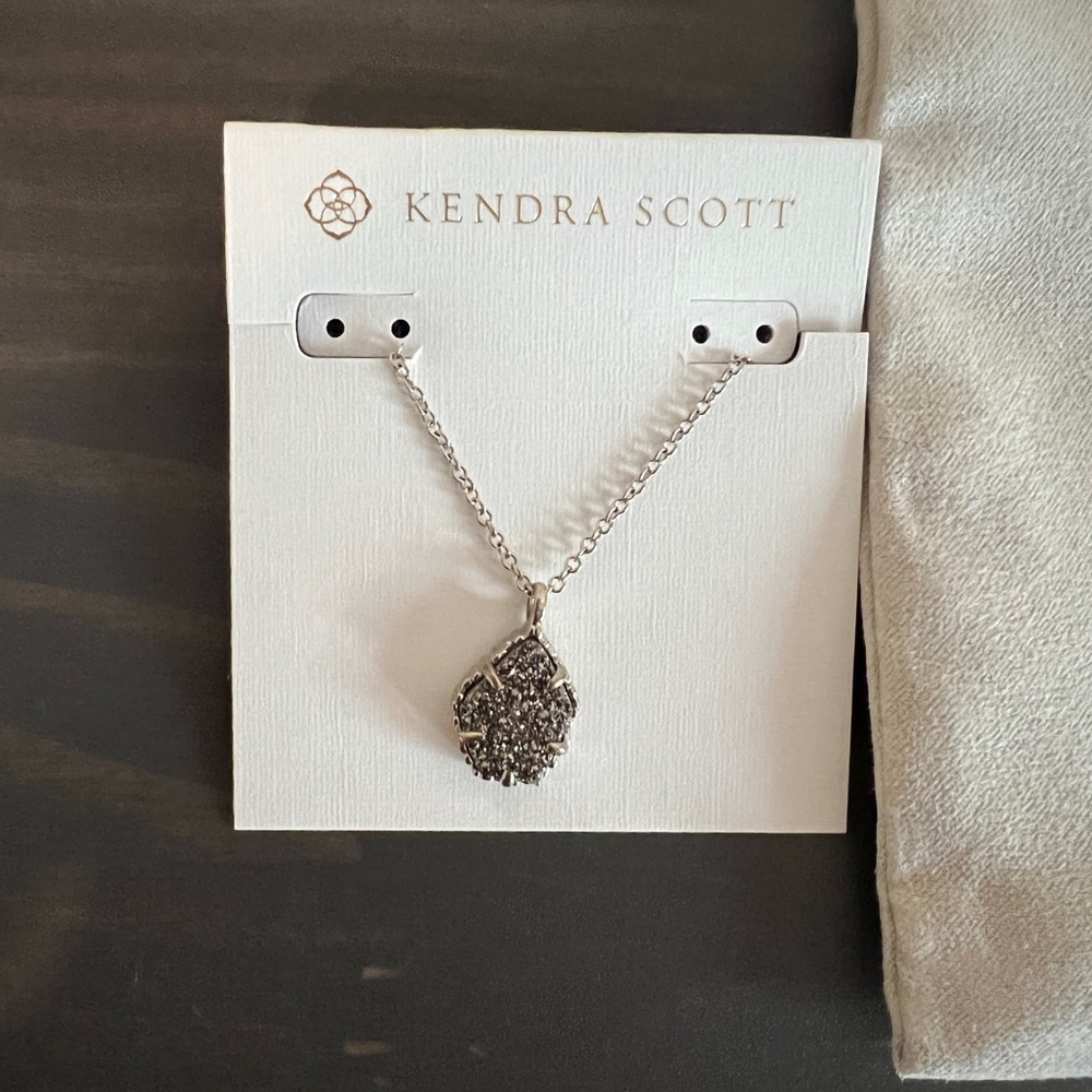 Kendra Scott necklace.